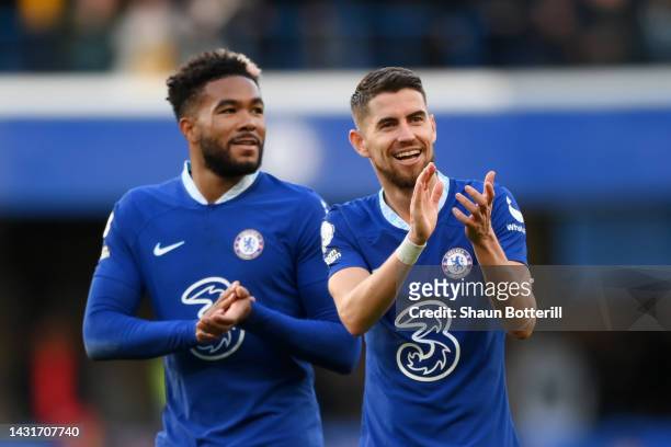 Reece James and Jorginho of Chelsea applaud the fans following their victory in the Premier League match between Chelsea FC and Wolverhampton...