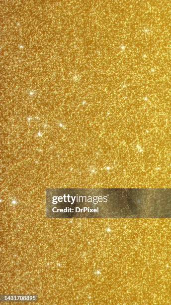 glitter golden background - purpurina fotografías e imágenes de stock