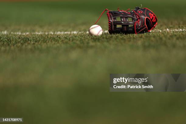 Glove is seen on the field prior to game two of the Wild Card Series between the Cleveland Guardians and the Tampa Bay Rays at Progressive Field on...