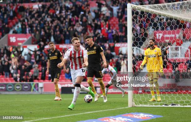 Liam Delap of Stoke City celebrates after he scores their third goal during the Sky Bet Championship between Stoke City and Sheffield United at...