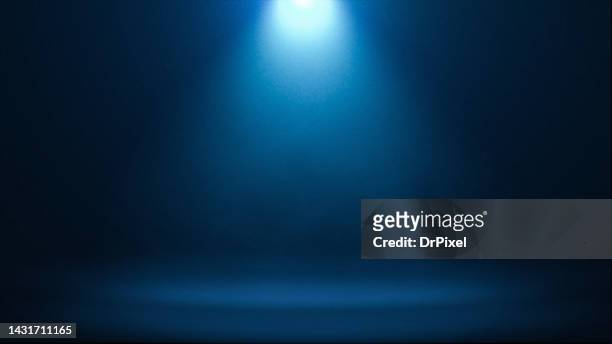 blue spotlight and stage - スポットライト　無人 ストックフォトと画像