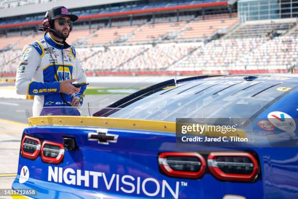 Chase Elliott, driver of the NAPA Auto Parts Chevrolet, looks on during practice for NASCAR Cup Series Bank of America Roval 400 at Charlotte Motor...