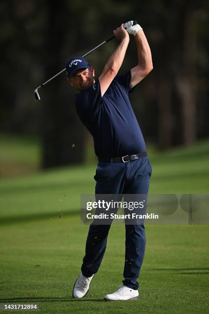 David Drysdale of Scotland plays his approach shot on the 16th hole during Day Three of the acciona Open de Espana presented by Madrid at Club de...