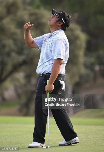 Kiradech Aphibarnrat of Thailand reacts to his putt on the 18th hole during Day Three of the acciona Open de Espana presented by Madrid at Club de...