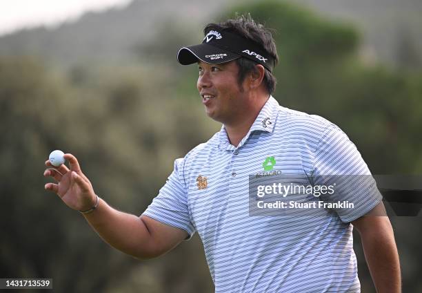 Kiradech Aphibarnrat of Thailand reacts to his putt on the 18th hole during Day Three of the acciona Open de Espana presented by Madrid at Club de...