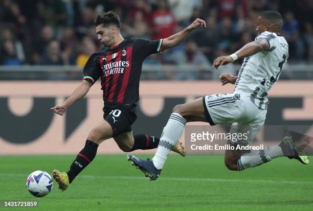 Brahim Diaz of AC Milan scores his goal during the Serie A match between AC MIlan and Juventus at Stadio Giuseppe Meazza on October 08, 2022 in...
