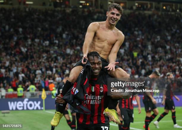 Brahim Diaz of AC Milan celebrates with team mate Rafael Leao after scoring to give the side a 2-0 lead during the Serie A match between AC Milan and...