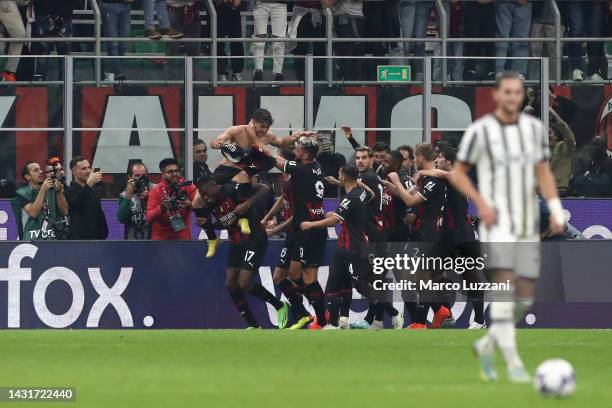 Brahim Diaz of AC Milan celebrates scoring their side's second goal with teammates during the Serie A match between AC Milan and Juventus at Stadio...