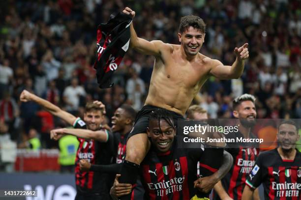 Brahim Diaz of AC Milan celebrates with team mate Rafael Leao after scoring to give the side a 2-0 lead during the Serie A match between AC Milan and...