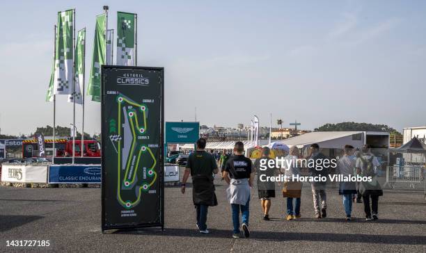 Visitors walk by a circuit map on the 2nd day of Estoril Classics in Fernanda Pires da Silva Estoril Circuit on October 08, 2022 in Estoril,...
