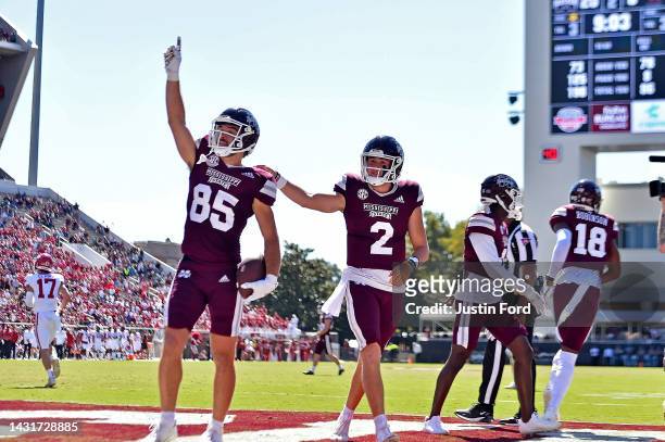 Austin Williams and Will Rogers of the Mississippi State Bulldogs celebrate during the first half against the Arkansas Razorbacks at Davis Wade...