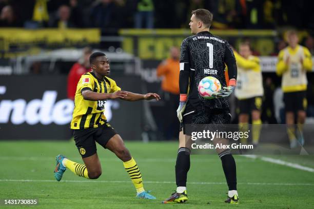 Youssoufa Moukoko of Borussia Dortmund celebrates after scoring their team's first goal during the Bundesliga match between Borussia Dortmund and FC...