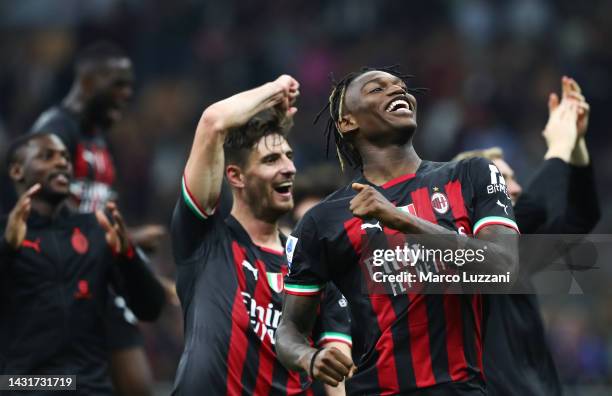 Rafael Leao of AC Milan celebrates their side's win with teammates after the final whistle of the Serie A match between AC Milan and Juventus at...