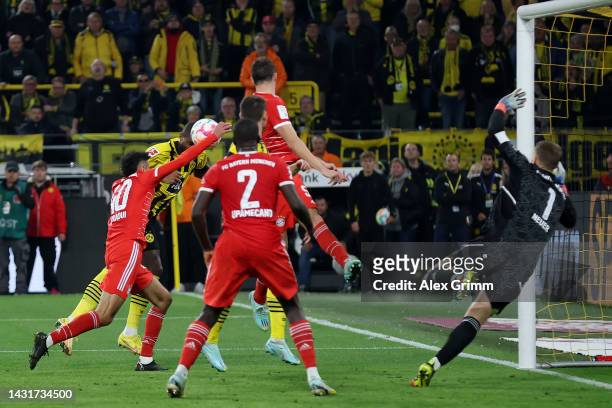 Anthony Modeste of Borussia Dortmund scores their team's second goal during the Bundesliga match between Borussia Dortmund and FC Bayern Muenchen at...
