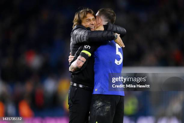 Antonio Conte celebrates with Pierre-Emile Hojbjerg of Tottenham Hotspur after their sides victory during the Premier League match between Brighton &...