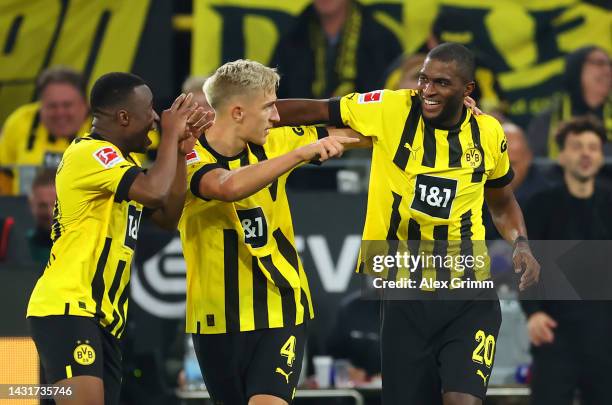 Anthony Modeste of Borussia Dortmund celebrates with teammates after scoring their team's second goal during the Bundesliga match between Borussia...