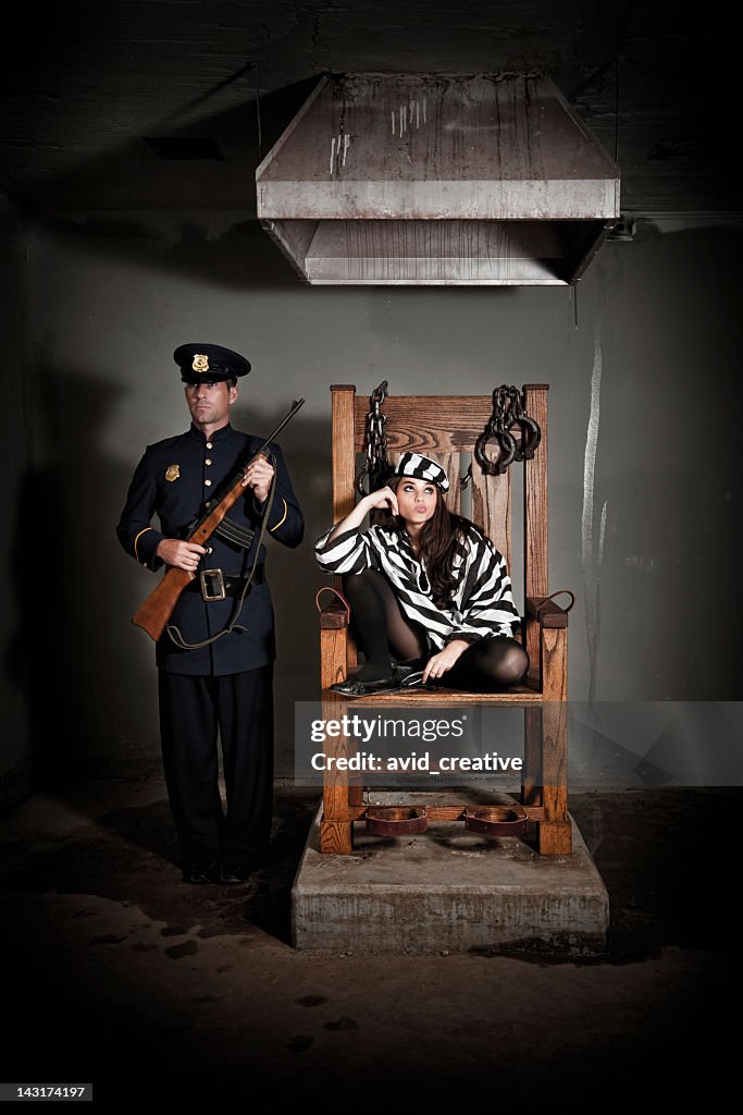 Bored Female Prisoner in Electric Chair