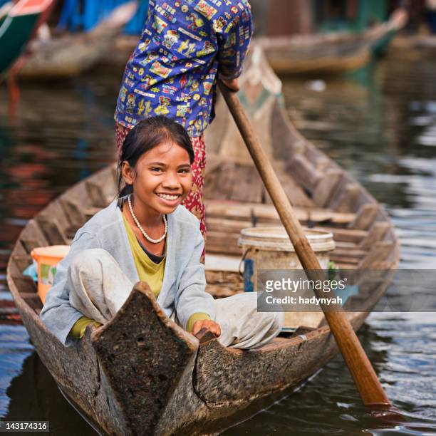 little girl in the boat, cambodia - tonle sap stock pictures, royalty-free photos & images