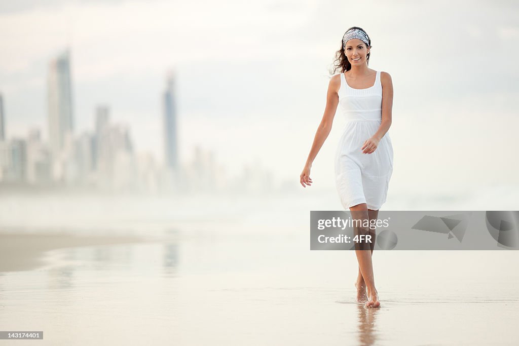 Woman walking down the Gold Coast, Australia