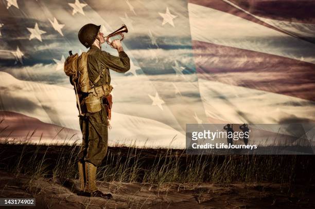 wwii soldier playing taps with flag horizon - bugle stock pictures, royalty-free photos & images