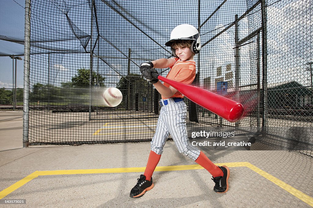 Young Baseball Swing in Batting Cage