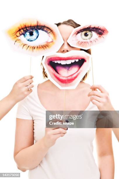 woman with eyes and smile signs infront of her - sensory perception stockfoto's en -beelden