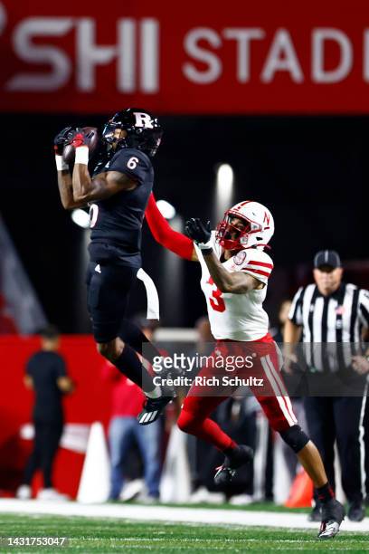 Christian Braswell of the Rutgers Scarlet Knights intercepts a pass intended for Trey Palmer of the Nebraska Cornhuskers during the first quarter of...
