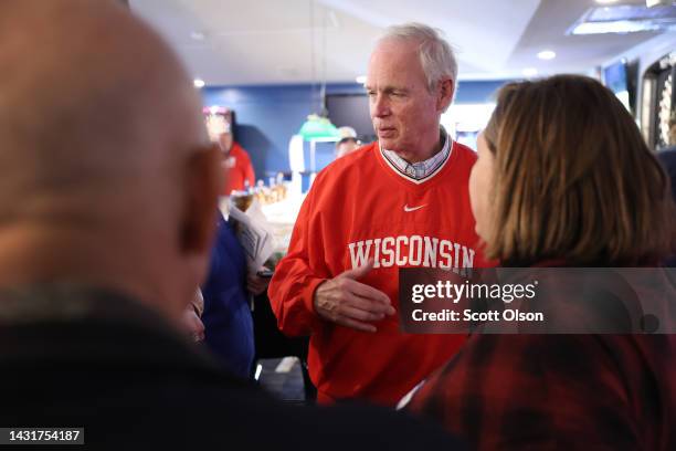Sen. Ron Johnson greets guests during a campaign stop at the Moose Lodge Octoberfest celebration on October 08, 2022 in Muskego, Wisconsin. Johnson...