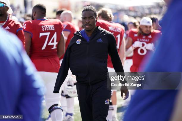 Quarterback Jalon Daniels of the Kansas Jayhawks walks the sideline in the second half during a game against the TCU Horned Frogs at David Booth...