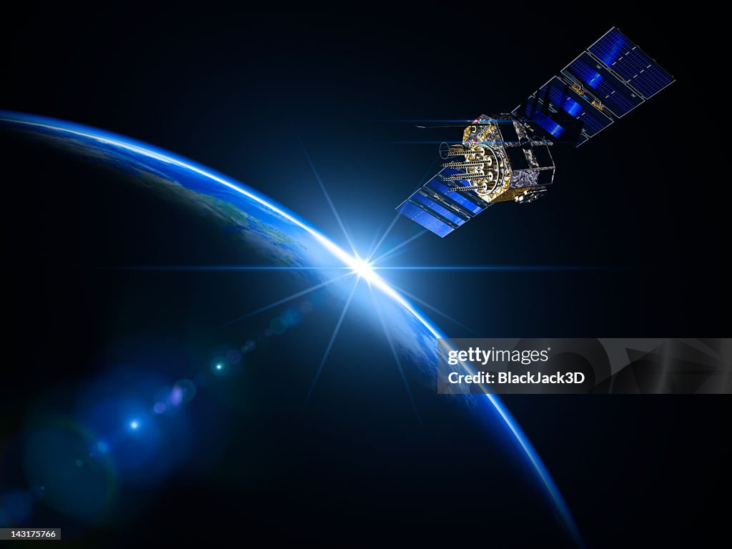 Satellite And Sunrise In Space