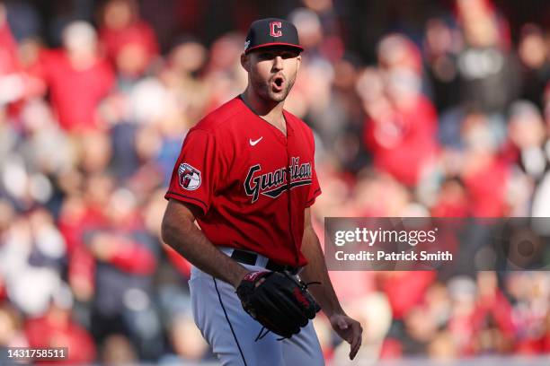 Sam Hentges of the Cleveland Guardians reacts in the thirteenth inning against the Tampa Bay Rays in game two of the Wild Card Series at Progressive...
