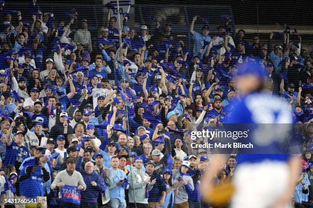 Toronto Blue Jays fans cheer as Kevin Gausman of the Toronto Blue Jays prepares to pitch against the Seattle Mariners during the second inning in...