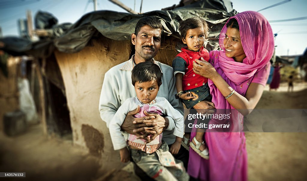 Real people from rural India: Happy parents with their children.