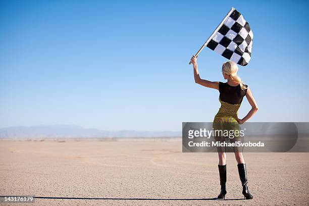 vintage checkered flag girl - women motorsport stock pictures, royalty-free photos & images