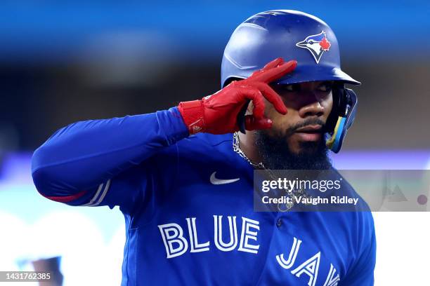 Teoscar Hernandez of the Toronto Blue Jays celebrates after hitting a two run home run to left field against Robbie Ray of the Seattle Mariners...