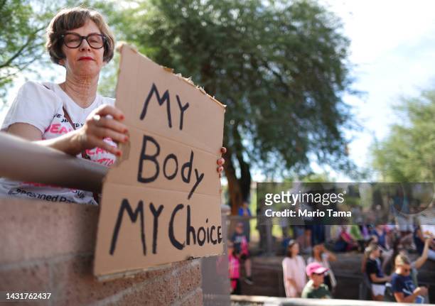 Protestor holds a sign reading 'My Body My Choice' at a Women's March rally where Arizona Secretary of State and Democratic gubernatorial candidate...