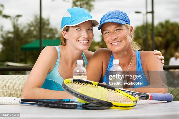 mother daughter tennis players doubles partners - country club woman stock pictures, royalty-free photos & images