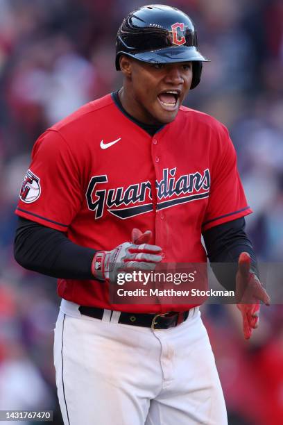 Oscar Gonzalez of the Cleveland Guardians celebrates after hitting a walk-off home run to end the game in the fifteenth inning against the Tampa Bay...