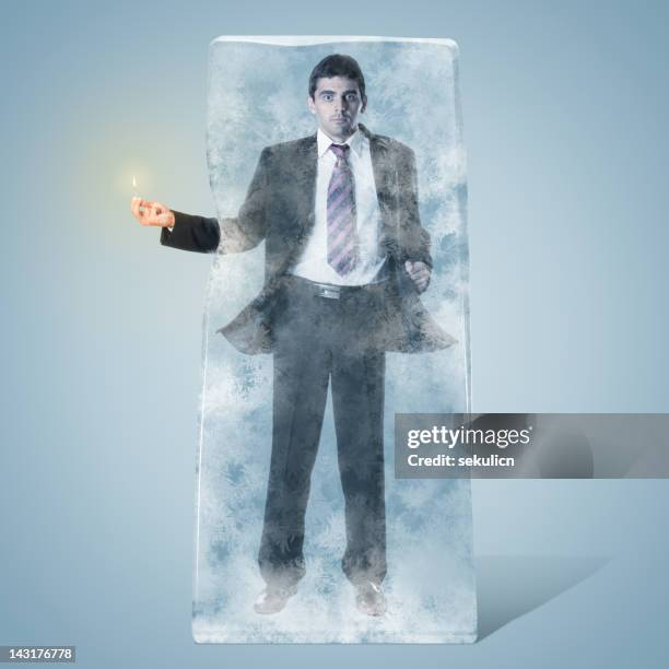 frozen homme d'affaires - allumettes photos et images de collection