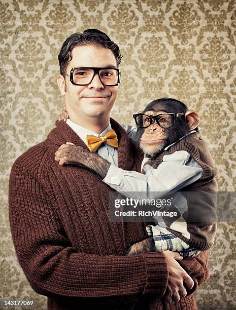 nerd with a chimp - man ape stock pictures, royalty-free photos & images