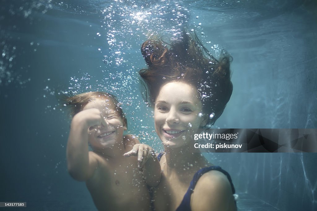 Mother and Daughter Underwater