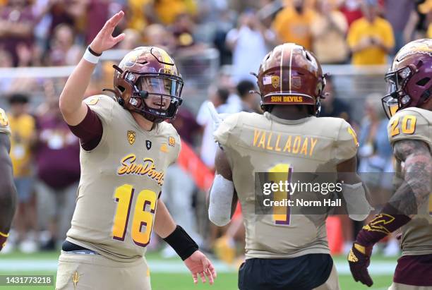 Trenton Bourquet of the Arizona State University Sun Devils celebrates with X Valladay after throwing a touchdown against the University of...