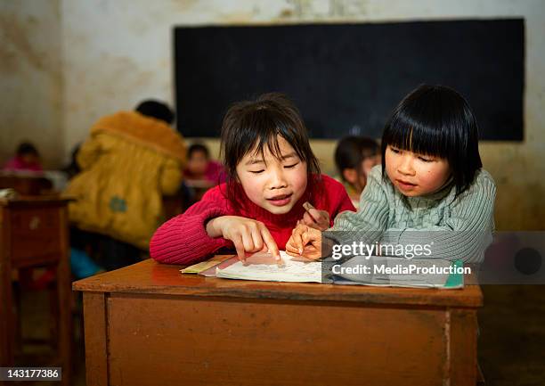 chinese school children - kids reading in classroom stock pictures, royalty-free photos & images