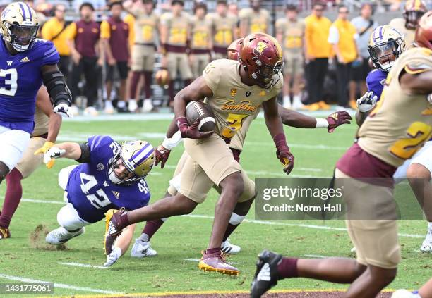 Taylor of the Arizona State University Sun Devils runs back a punt against the University of Washington Huskies during the second quarter at Sun...