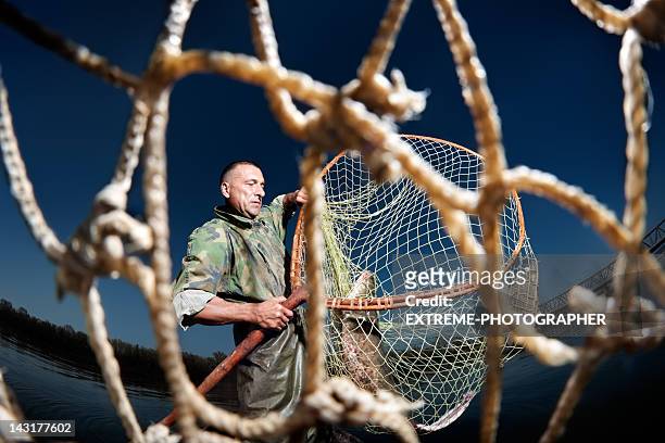 fisherman’s net - meerval stockfoto's en -beelden