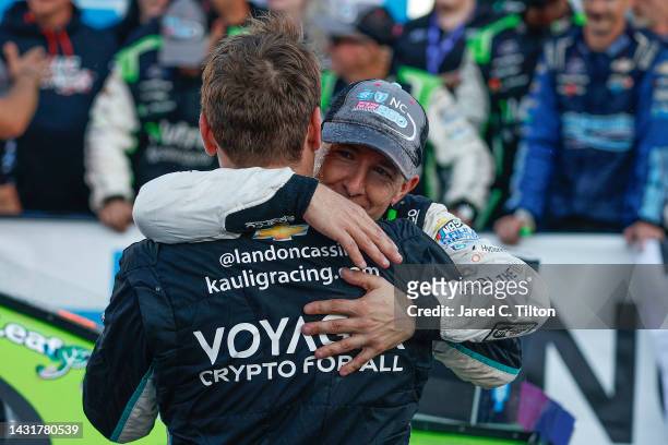 Allmendinger, driver of the Nutrien Ag Solutions Chevrolet, is congratulated by Landon Cassill, driver of the Voyager: Crypto for All Chevrolet, in...