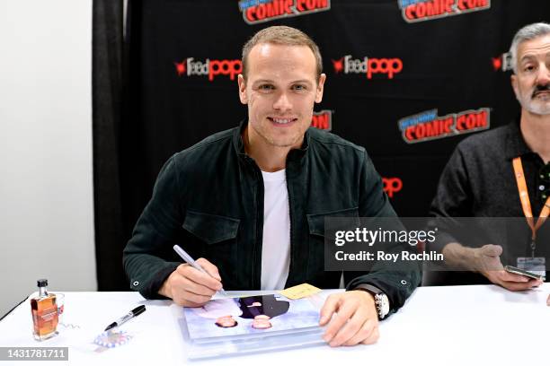 Sam Heughan poses during New York Comic Con 2022 on October 08, 2022 in New York City.