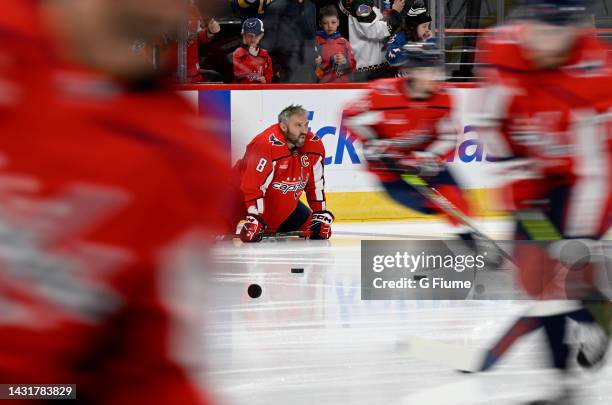 Alex Ovechkin of the Washington Capitals warms up before the preseason game against the Columbus Blue Jackets at Capital One Arena on October 08,...