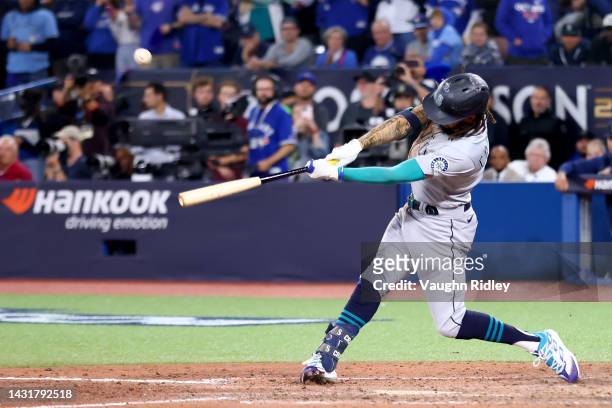 Crawford of the Seattle Mariners hits a three run double against Jordan Romano of the Toronto Blue Jays during the eighth inning in game two of the...