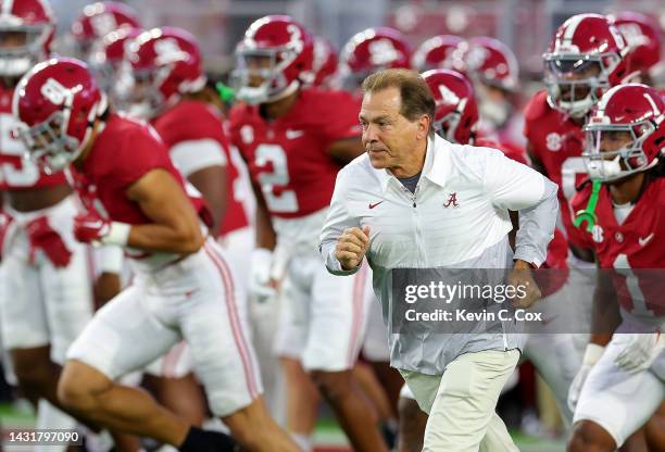 Head coach Nick Saban of the Alabama Crimson Tide leads the team onto the field prior to facing the Texas A&M Aggies at Bryant-Denny Stadium on...